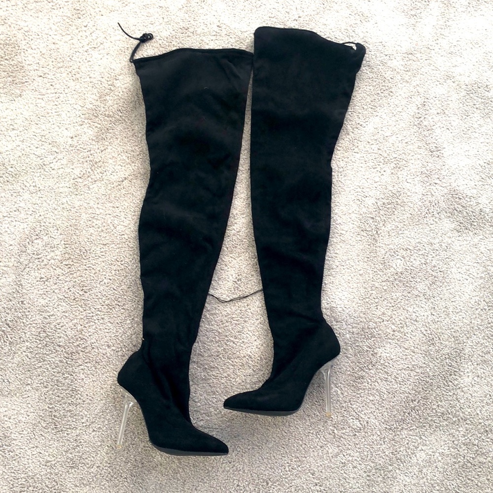 Higher above thigh black boots